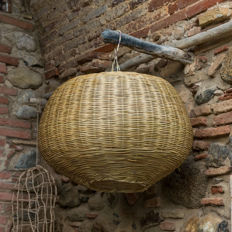 Suspension Boule Tressée en Roseau Naturel - Luminaire Artisanal