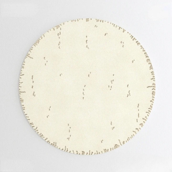 Tapis rond crème traits