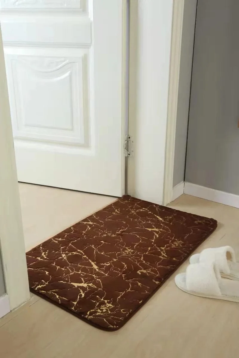Tapis de bain marron et doré