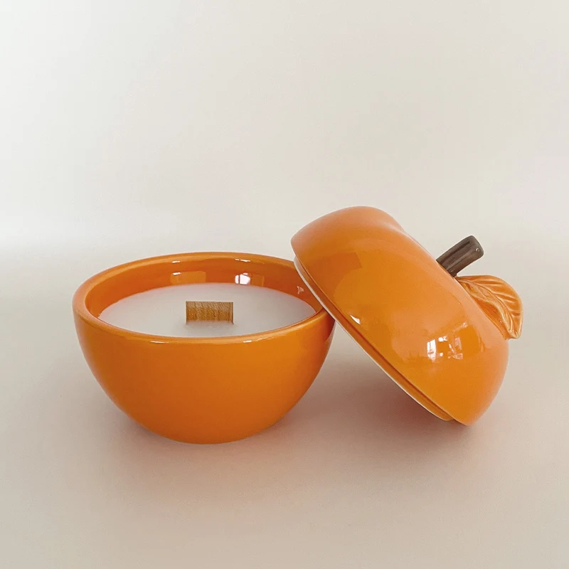 Bougie "POMME" orange senteur orange 018129